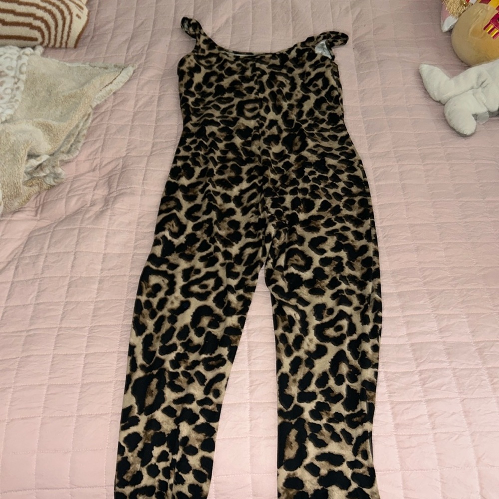 NEW worn once cheetah body suit